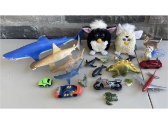 Small Toy Collection - Furbys, Plastic Sea Life, Cars, And Airplane