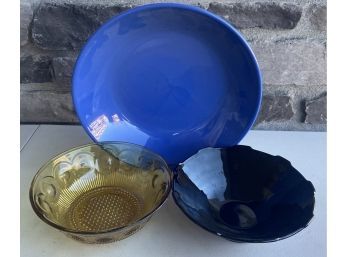 Collection Of Pottery And Glass Bowls - Amber Coin Dot, Black Amethyst Glass Bowl, And Blue Vista Bowl