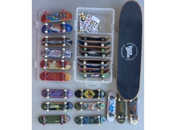 Collection Of Tech Decks And Accessories