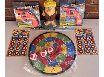 Small Toy Lot  - Velcro Dart Game, Cap Guns, & Flintstones Plastic Coin Bank