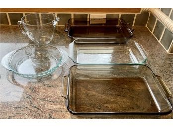 Collection Of Glass Baking Dishes Including A Measuring Cup, Pyrex Pie Plate, And 3 Pyrex Casserole Dishes
