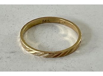 Stamped CW 14k Gold Band Size 4  - Weighs .8 Grams