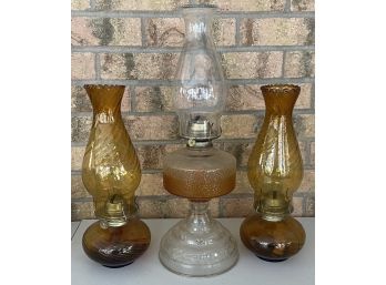 (3) Amber Colored Hurricane Oil Lamps