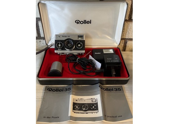 Rollei 35 Camera With Flash, Accessories, Soft Case, And Owners Manual