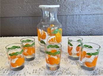 Anchor Hocking Orange Carafe With 5 Glasses And Plastic Lid