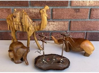 Carved Wooden Camel, Elephant, And Rhino With Brass Bicycle Sculpture