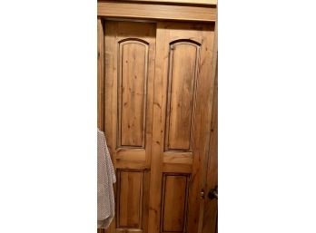 Pair Of Custom Knotty Alder Sliding Bathroom Doors