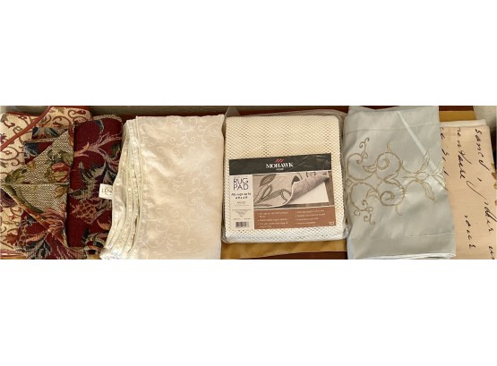 Collection Of Linen Table Cloths And Runners With Mohawk Rug Pad