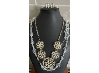 (2) Necklaces (1) Gold Tone Flower Statement Necklace W Earrings (1) Crystal Bead (one Side Needs Reattached)