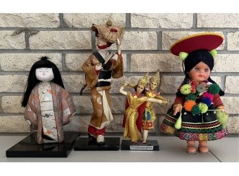 (4) Assorted Standing Dolls Including Geisha, Thai Classic, And More