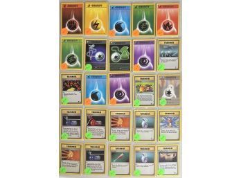 30 Plus Assorted Pokemon Energy And Trainer Cards With Plastic Sleeves