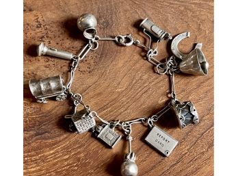Antique Sterling Silver Charm Bracelet - Golf Clubs, Covered Wagon, Drum, Bell, And More - Weighs 18.4  Grams