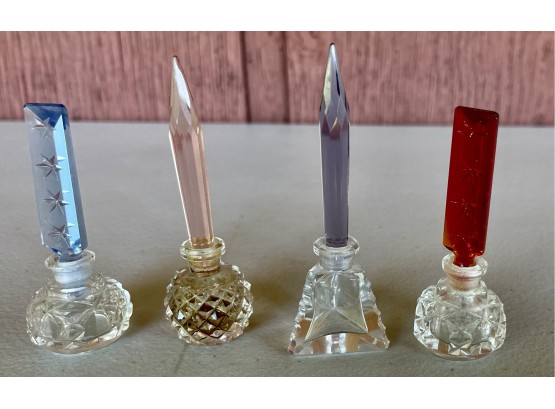 (4) Small Crystal Perfume Bottles With Cut And Faceted Crystal Tops