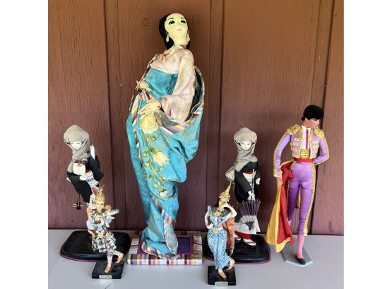 (6) Assorted Figurines - 27 Inch Geisha, (2) Thailand K.J. Dolls, Spain Matador, And (2) Japan (as Is)
