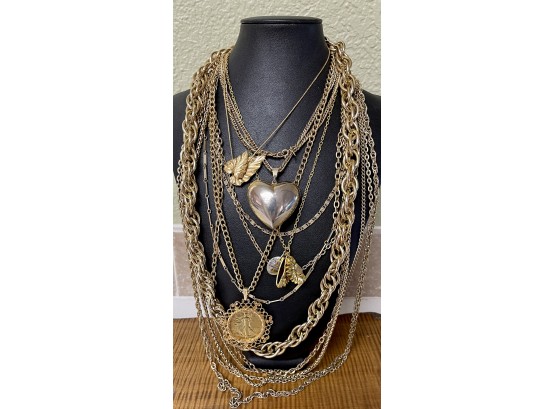 Large Collection Of Gold Tone Necklaces - Rope Chains, Sarah Coventry, 1945 Half Dollar Coin, And More