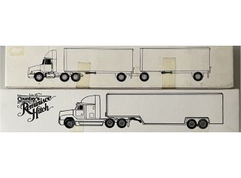 ERTL Freightliner Cab With Drop Bed Trailer And White GMC Arrow Convectional With Pup Trailers