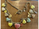 Stunning Vintage Coach Jewelry Gold Tone And Enamel Puffy Heart Necklace  With Coach Charms