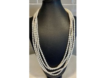 (2) 54' Strands Of Freshwater Pearls With Sterling Silver Clasps.
