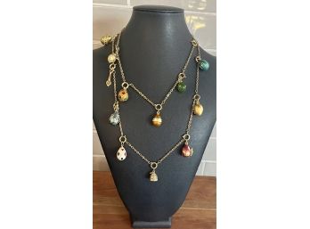 Joan Rivers Gold Tone 40' Necklace With 17 Fabrege Type Egg Charms, Birds, And More