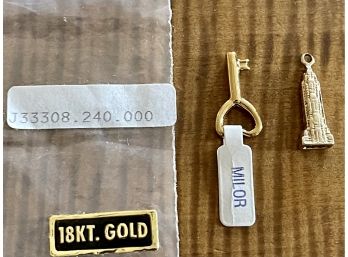 14k Gold Building Charm (3.7 Grams) And A 18k Gold Key Charm (.9 Grams)