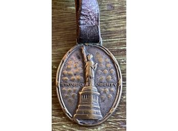 Antique Staue Of Liberty Brass Suveneir Fob With Leather Strap And Bucket