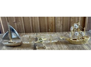 Vintage Gold Tone And Crystal Miniature Airplane, Ship, And Sail Boat Clock
