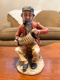 Ceramic Man Playing Accordion Figurine
