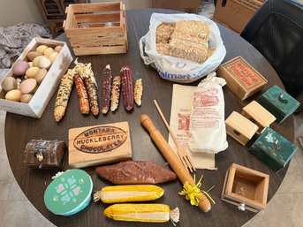 Box Full Of Faux Corn, Bread Eggs And Other Misc Items