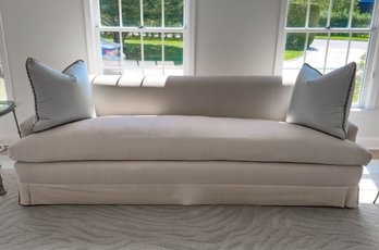 Custom Skirted Sofa With Bench Seat  Cushion In White Upholstery And Light Green Throw Pillows