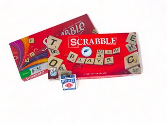 Two Scrabble Board Games And Deck Of Playing Cards