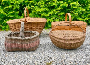 Four Antique And Vintage Picnic Style Baskets