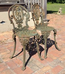 Pair Of Early Cast Iron Chairs