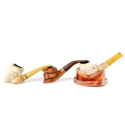 Three Vintage Meerschaum Pipes And An Italian Carved Stone Pipe Rest