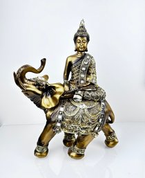 Buddha Riding Elephant With Raised Trunk