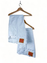 Two Pairs Of White Levis Jeans