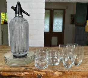 Vintage Chain Mail Covered Seltzer Bottle, French Glass Salad Plates, And High End Tumblers