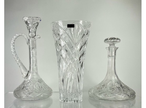 Two Cut Crystal Decanters And A New Waterford Marquis Vase