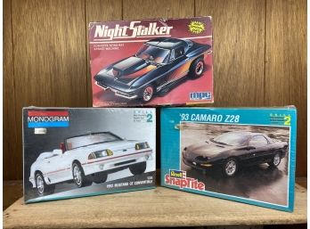 Three Model Car Kits - All Pieces 2 Are In Unopened Box - Camaro, Mustang And Night Stalker
