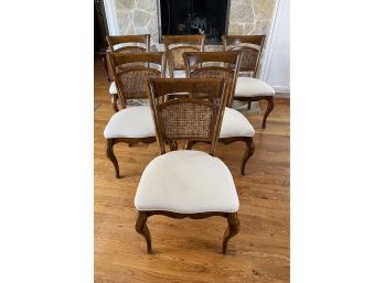 Eight Cane Back Upholstered Seat Dining Chairs