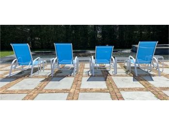 Four Outdoor Lounge Chairs With 4 Side Tables