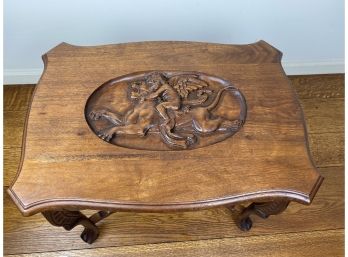 Antique Side Table With Carved Top Of Boy On Flying Creature