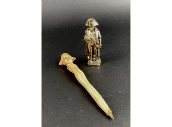 Two Napoleon Mementos One Small Metal Figure And One Resin Pen