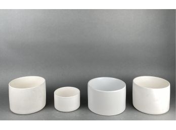 CB2 And Groves & Co. Four Cylindrical Ceramic Vases In White Glaze