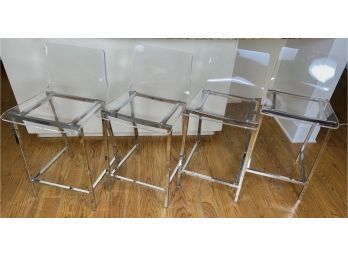Four Lucite And Chrome Counter Stools