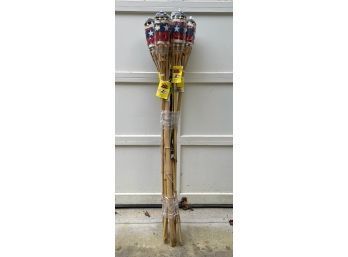 Bundle Of Tiki Torches In Red White Blue And Natural