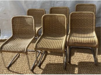 Six Vintage Chrome & Wicker Cantilever Chairs