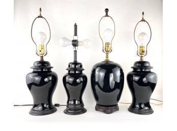 Collection Of Four Black Table Lamps