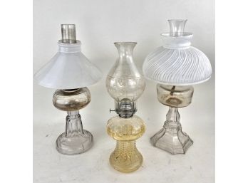3 Vintage Or Antique Glass Oil Lamps Or Lanterns With White Glass Chade Or Decorative Etched Hurricane