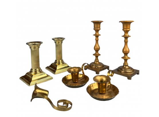 Assortment Of Brass Candlesticks And A Snuffer