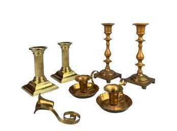 Assortment Of Brass Candlesticks And A Snuffer